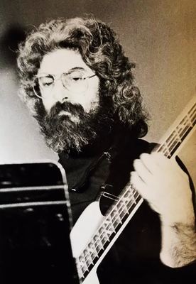 Koorosh Angali — Bass